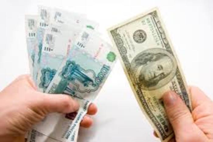 Доллар возвратился до уровня ниже 70 рублей